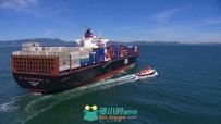 海中行驶的货轮有船艇护卫视频素材